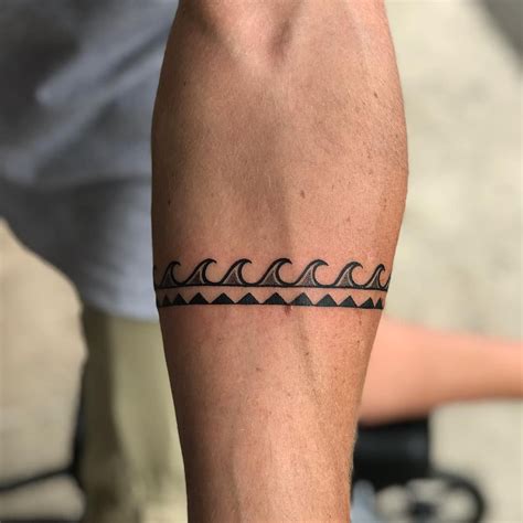 Tatouage Bracelet Homme Signification La signification du tatouage bracelet maorie bras homme - Charliebirdy
